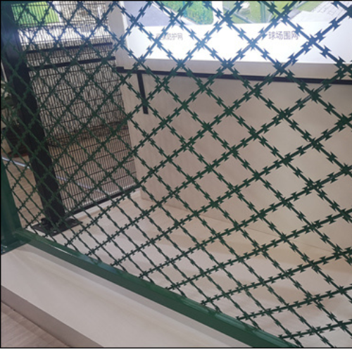 Welded razor wall fence for commercial properties